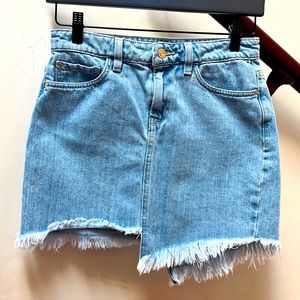 Guess light wash jean skirt. A-symmetrical with fringe. Size 0. Like new.